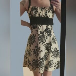 B. Smart Cream Dress with Black Floral Print